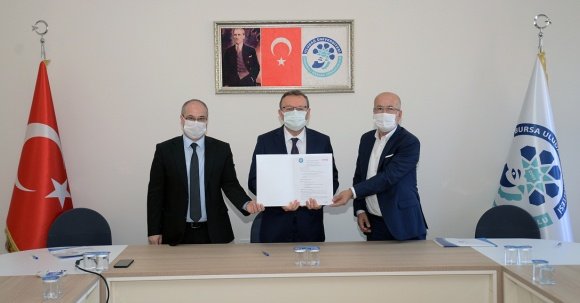 PROF DR AHMET SAIM KILAVUZ PROF DR CAGATAN TASKIN BEBBUS TEKSTIL NIHAT ARI ILE GIYIM TEKNOLOJILERI ANLASMASI PROF DR AHMET SAIM KILAVUZ PROF DR CAGATAN TASKIN BEBBUS TEKSTIL NIHAT ARI ILE GIYIM TEKNOLOJILERI ANLASMASI