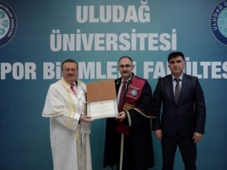 PROF DR SULEYMAN SAHiN CUBBE GiYME TORENi BUU REKTORU PROF DR AHMET SAiM KILAVUZ