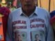 MEHMET ALi ZENGi VE SLOGAN YAZDIĞI GÖMLEĞi